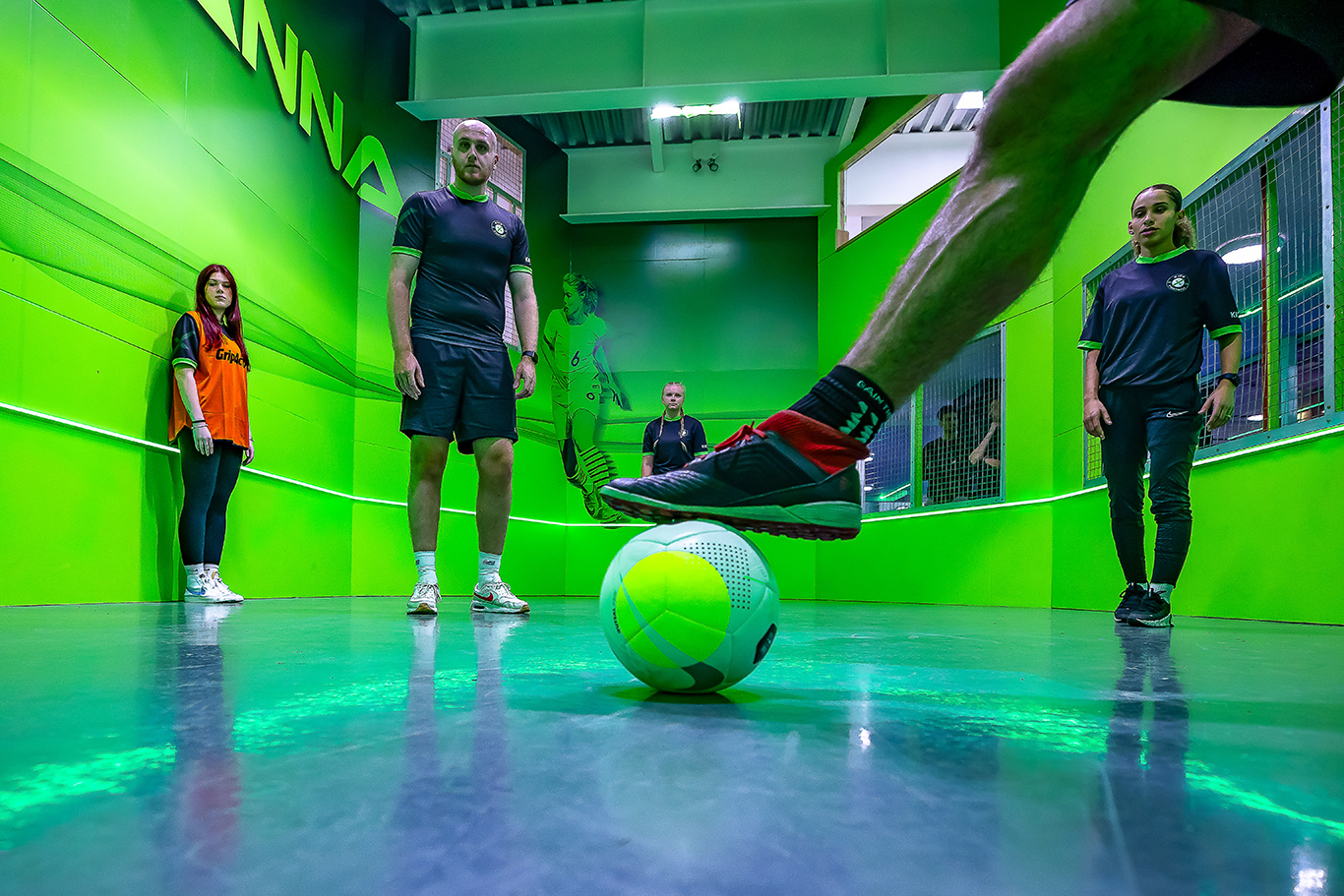 Green panna court in use at KickX arena